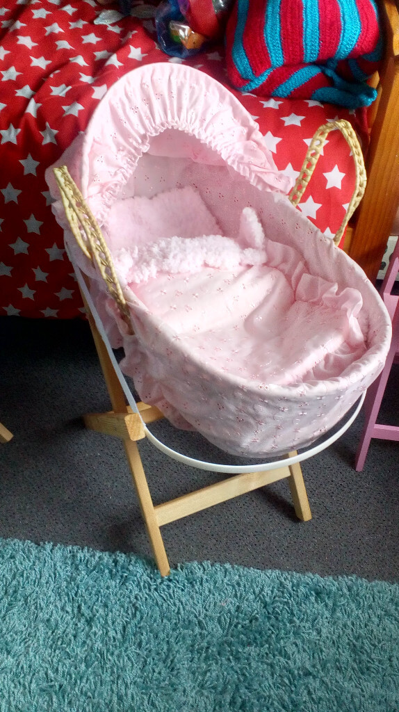 pink dolls moses basket with stand